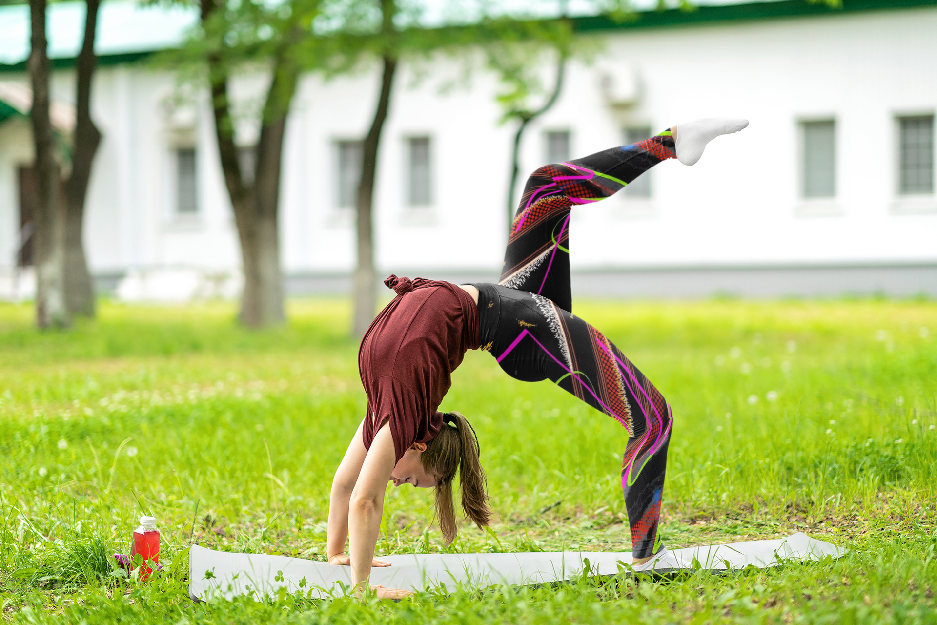 sublimated-leggings-mockup-of-a-young-woman-doing-yoga-at-a-park-m11309-r-el2.png